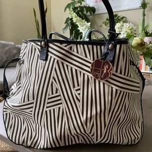 Henri Bendel waxed canvas and leather tote bag
